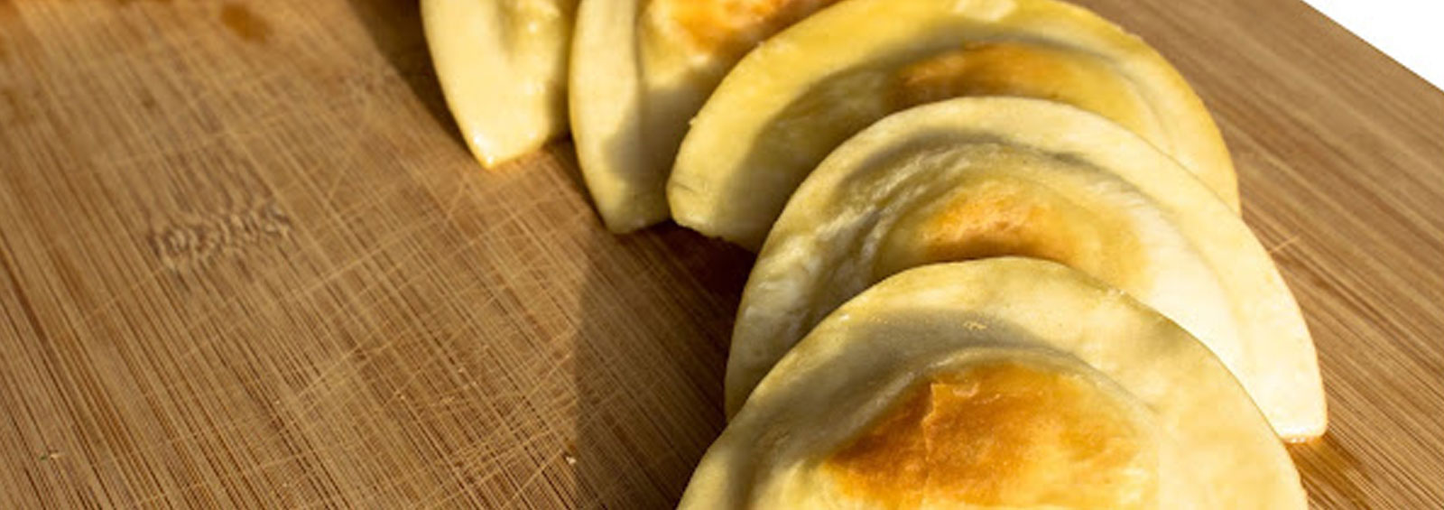Pierogies On Cutting Board